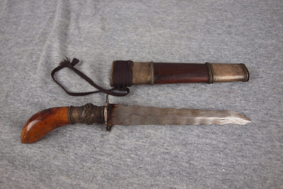 Early Middle Eastern dagger & sheath with silver on han: Early Middle Eastern dagger & sheath with silver on handle & wooden sheath 10 1/2"