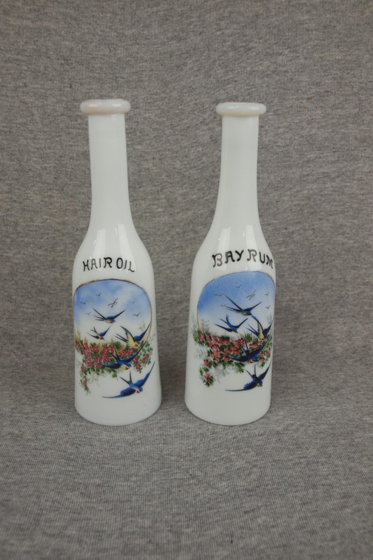 Pair of milk glass barber bottles: Pair of milk glass barber bottles with blue birds, 9", "Bayrum" and "Hair Oil"