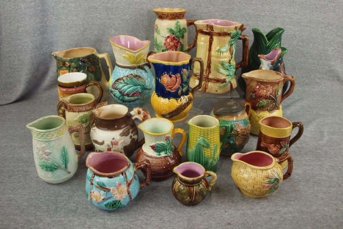 Majolica lot of 19 creamers & pitchers, various: Majolica lot of 19 creamers & pitchers, various condition
