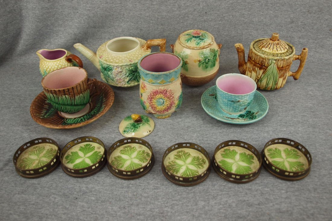 Majolica lot of 14 items - coasters, sugar, creamer,: Majolica lot of 14 items - coasters, sugar, creamer, spooner, tea pots & more, various condition
