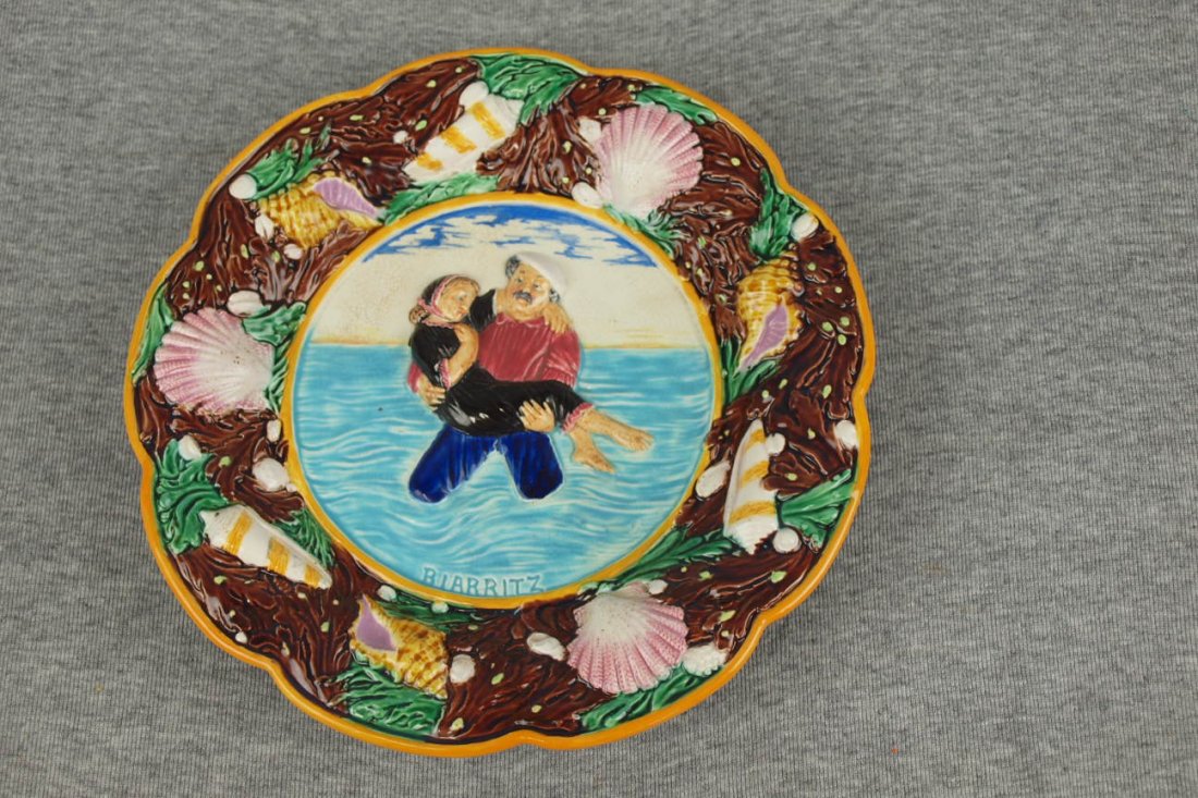 Majolica George Jones shrimping plate of sailor: Majolica George Jones shrimping plate of sailor carrying girl, professional rim repair, 9 1/2"