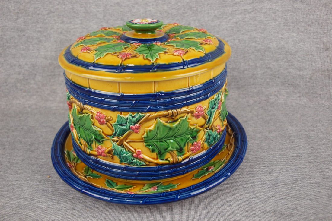 Majolica Minton holly & berry covered tureen with under: Majolica Minton holly & berry covered tureen with under tray, 8"l, 11"d, professional repair to lid rim