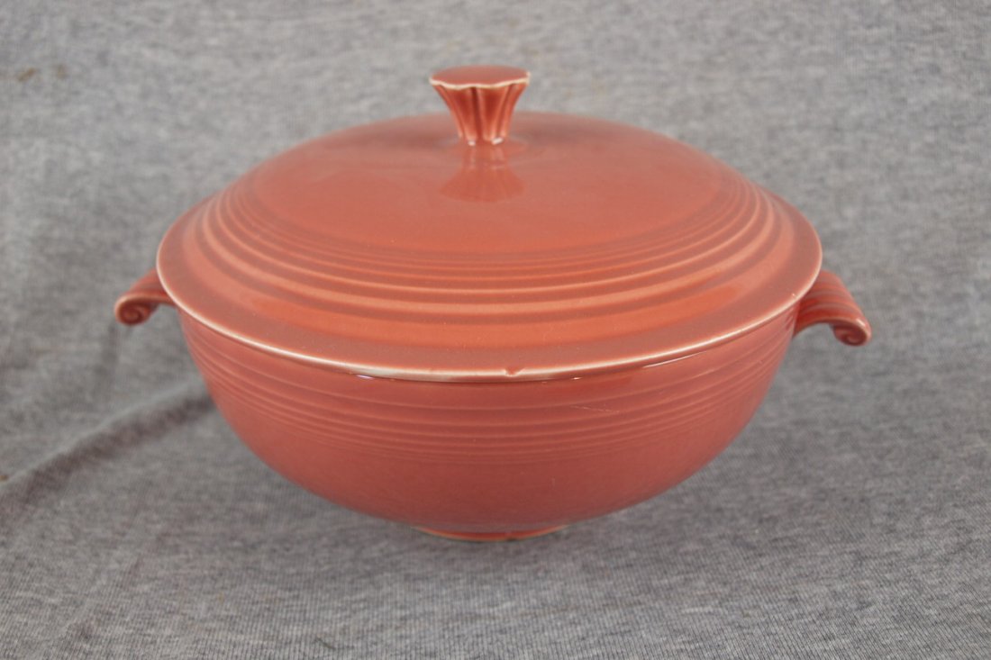 Fiesta casserole, rose, minor nick to finial: Fiesta casserole, rose, minor nick to finial