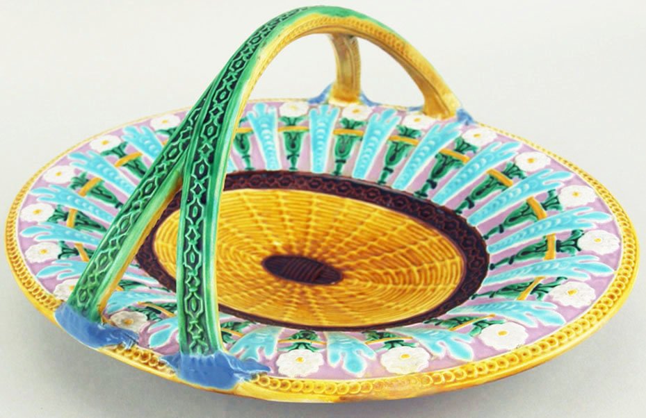 A rare and excellent quality beautifully coloured: A rare and excellent quality beautifully coloured George Jones card tray, the oval dish with a brown and orange basket weave centre with a border of radiating, formal flowers and stylized turquoise ac