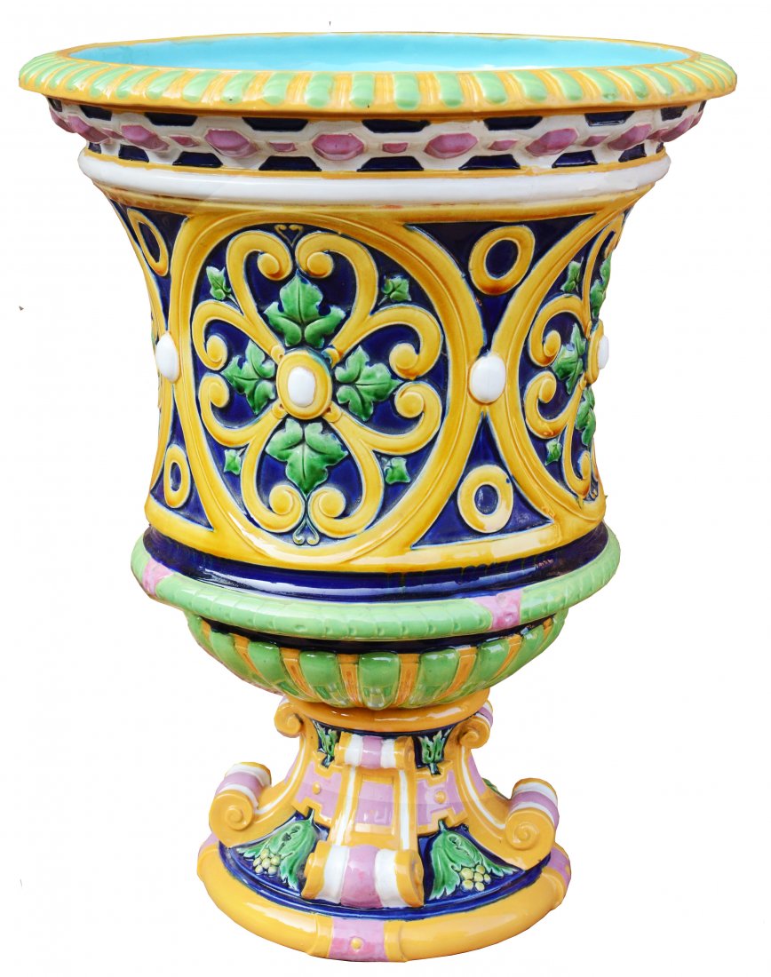 A very rare Monumental Minton Majolica Renaissance: A very rare Monumental Minton Majolica Renaissance Style Jardiniere, only known example. The body decorated with brightly glazed florettes and leaf strap work against a cobalt ground, the circular bas