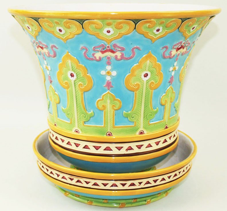 A very rare Minton Majolica Chinese style jardiniere: A very rare Minton Majolica Chinese style jardiniere and under plate c.1875, the flared jardiniere decorated with brightly coloured Chinese ornamentation against a turquoise ground with a running band