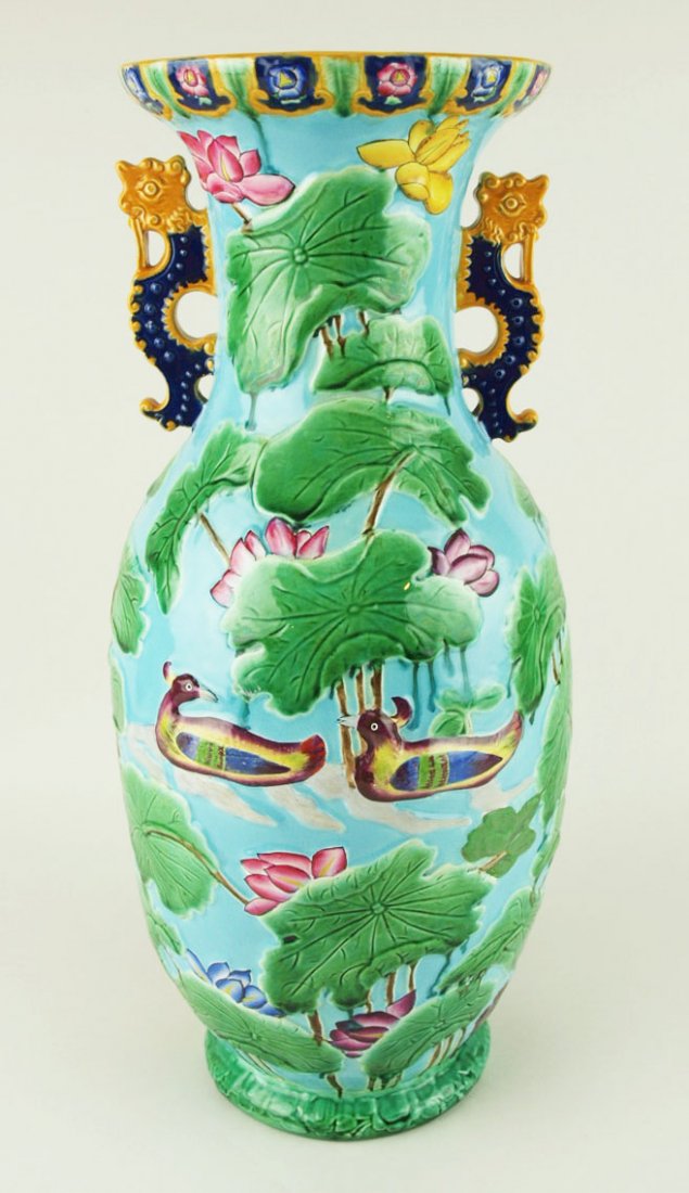 An excellent quality large Minton Majolica Chinoiserie: An excellent quality large Minton Majolica Chinoiserie ‘Indian’ vase c.1875, the turquoise glazed body decorated with Chinese style exotic birds, butterflies, and peonies to one side and ducks and
