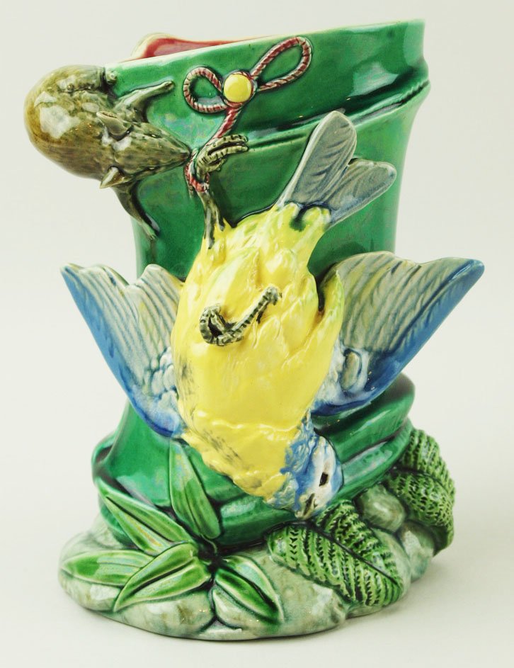 A very rare Minton Majolica vase c.1875 designed by: A very rare Minton Majolica vase c.1875 designed by Paul Comolera, 6.5” h. Molded as a green section of bamboo shoot with a pink interior and an inquisitive field mouse nibbling a string attached to
