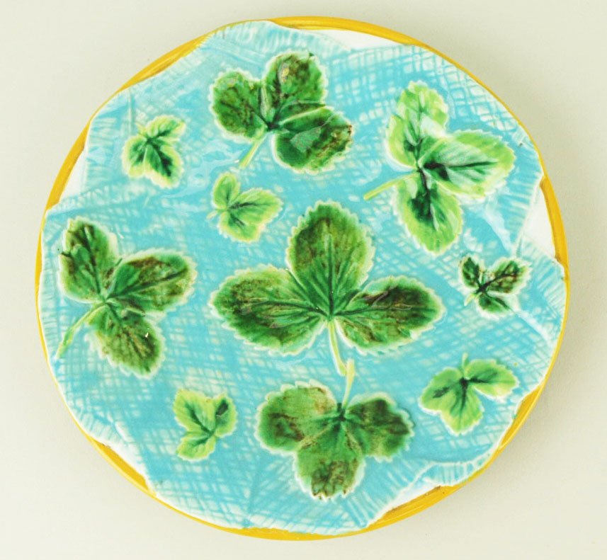 A George Jones ‘napkin’ strawberry plate. c.1875,: A George Jones ‘napkin’ strawberry plate. c.1875, decorated with a turquoise napkin on a white ground strewn with strawberry leaves, 8” 'CURATED & CATALOGUED BY NICOLAUS BOSTON'