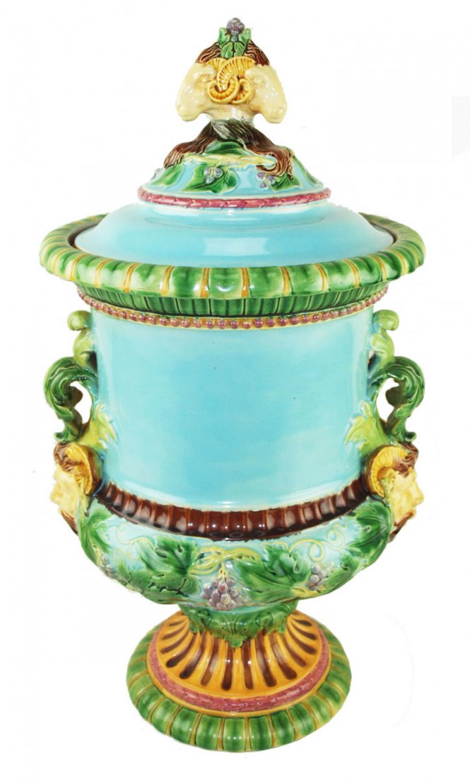 A very rare and handsome George Jones Renaissance: A very rare and handsome George Jones Renaissance style Majolica wine cooler and cover. 1875, 24”h, marks, shape no 342. Of compana shape with a tapering base decorated with vines and grapes, the