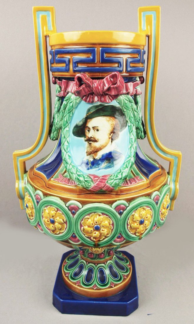 A rare Majolica T.C. Brown Westhead and Moore: A rare Majolica T.C. Brown Westhead and Moore ‘Shakespeare’ vase. c.1876, the elaborate and brightly glazed Sevres style vase with a painted panel depicting William Shakespeare. Lacking cover, 21�