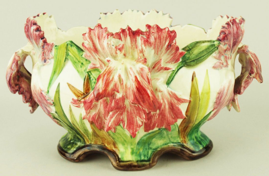 A large oval Delphin Massier oval planter decorated: A large oval Delphin Massier oval planter decorated with large pink tipped chrysanthemum to the front and sides c.1880, 7”h, 12”w 'CURATED & CATALOGUED BY NICOLAUS BOSTON'