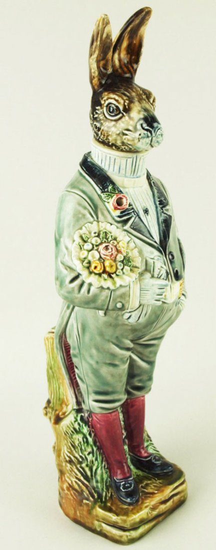 A Rare B&L, Gesetzl Gesch Majolica Groom Hare Decanter: A Rare B&L, Gesetzl Gesch Majolica Groom Hare Decanter c.1890 (not marked) Modeled as hare dressed in his wedding suit with a button hole and a bouquet of flowers for his bride. 'CURATED & CATALOGUED 