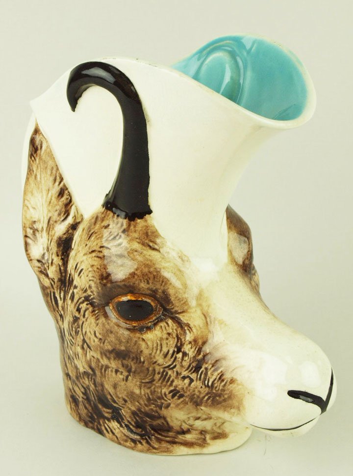 A Very Rare Sarreguemines water pitcher “Le chamois”: A Very Rare Sarreguemines water pitcher “Le chamois” c.1880 Shape # 4023 Modeled as a grey ram with black antlers with a white spout and handle Provenance: Helen Cunningham 'CURATED & CATALOGUED B