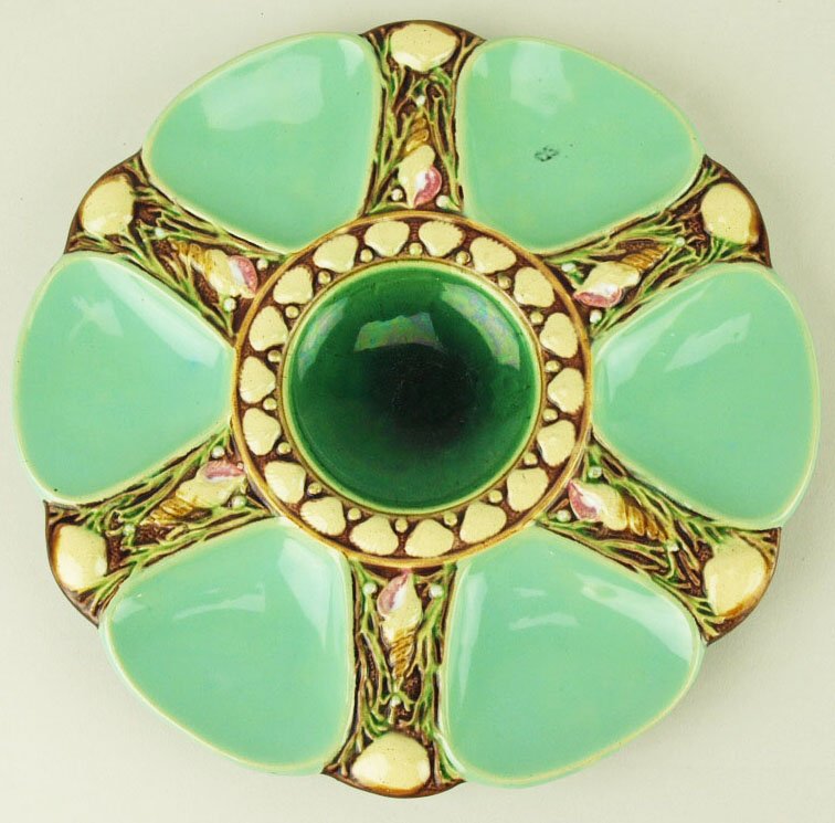 A Fine Quality Minton Majolica duck egg green 6 well: A Fine Quality Minton Majolica duck egg green 6 well oyster plate c.1875 Modeled as a circular plate with 6 duck egg green wells separated by shells and seaweed, duck egg green circular central well s