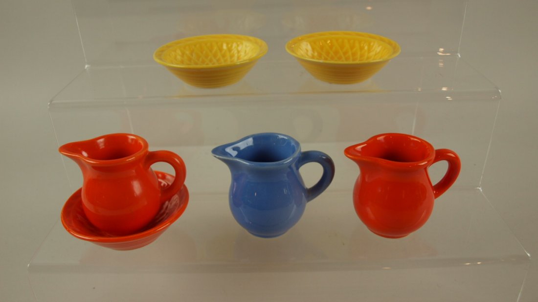 Harlequin nut dish & individual creamer group - 2: Harlequin nut dish & individual creamer group - 2 yellow & 1 red nut dishes, 2 red & 1 mauve blue creamers