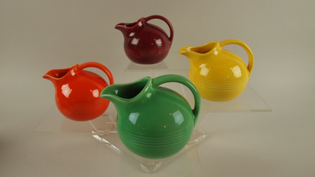 Harlequin novelty creamer group of 4 - green, red,: Harlequin novelty creamer group of 4 - green, red, yellow, maroon