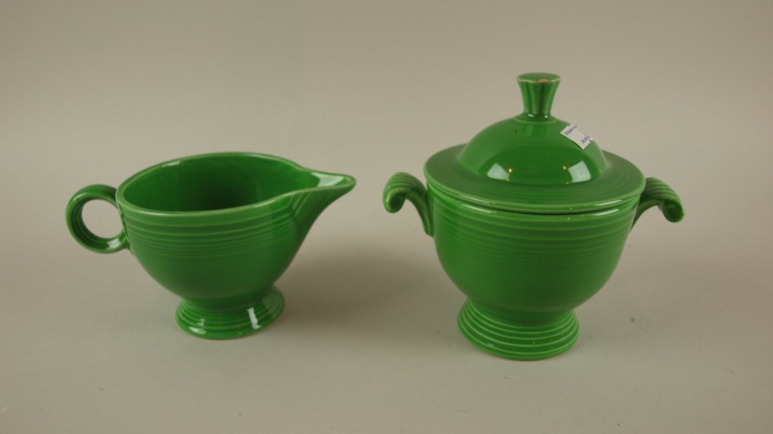 Fiesta cream & sugar, medium green, glaze miss to: Fiesta cream & sugar, medium green, glaze miss to finial