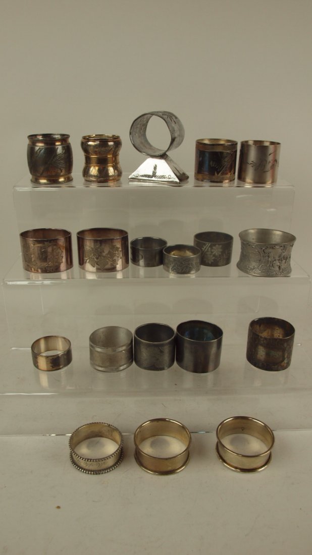 Lot of 3 sterling silver (1.22 oz) and 16 assorted: Lot of 3 sterling silver (1.22 oz) and 16 assorted silver plate napkin rings
