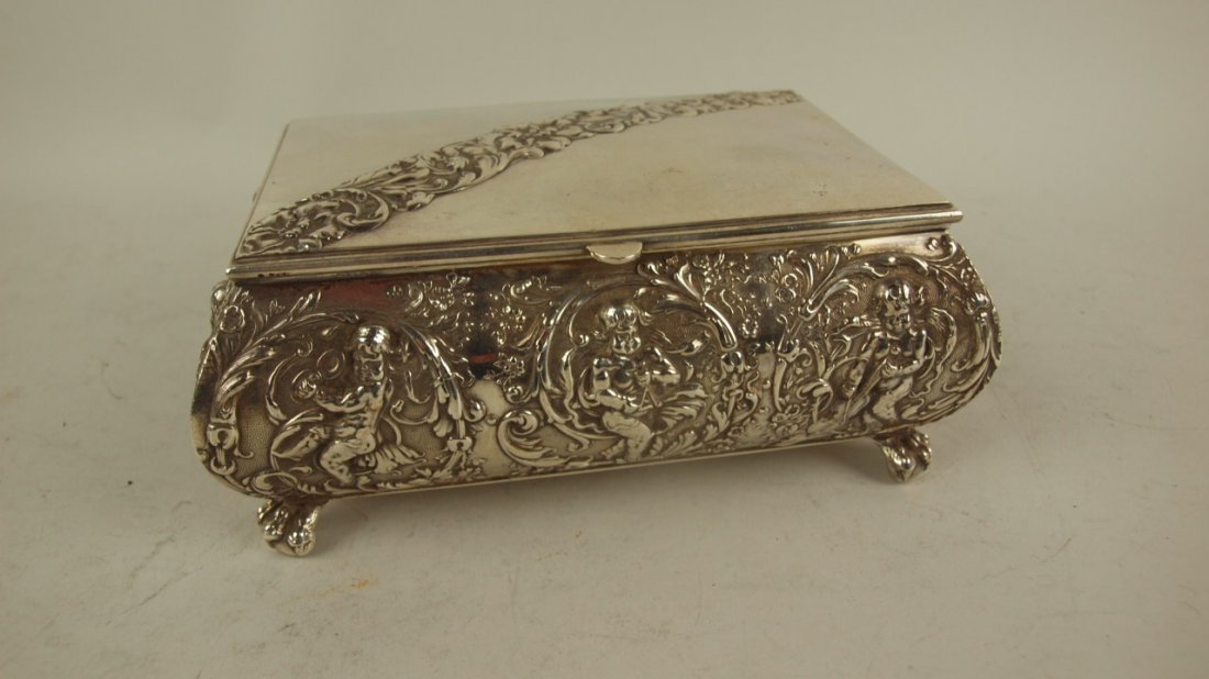 Pairpoint Victorian silver plate jewel box with musical: Pairpoint Victorian silver plate jewel box with musical cherubs in relief, 7 1/2" w