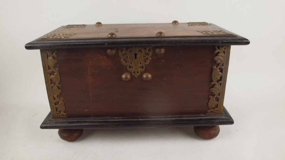 Wooden trunk with brass ormolu corners: Wooden trunk with brass ormolu corners