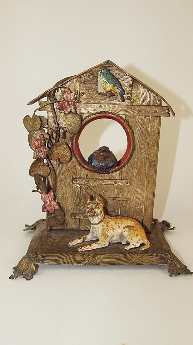 Victorian brass figural of dog at door with songbird in: Victorian brass figural of dog at door with songbird in window, cold painted , 7 1/2"