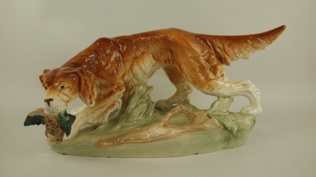 Royal Dux hunting dog with bird figure, 20"l, 9 1/2"h: Royal Dux hunting dog with bird figure, 20"l, 9 1/2"h