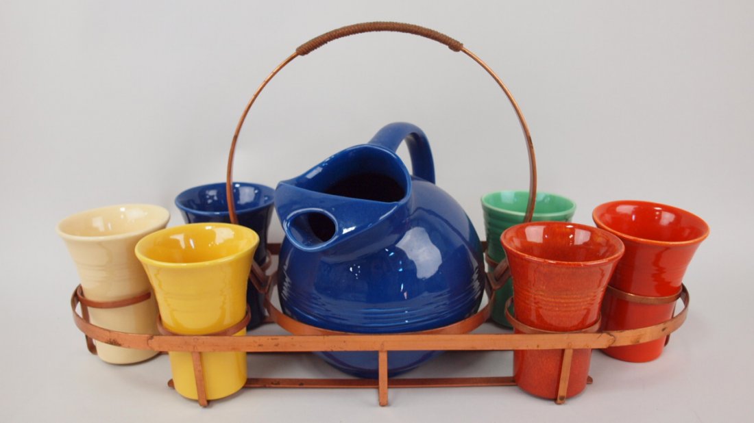 Bauer Pottery ringware ball jug and 6 tumblers with: Bauer Pottery ringware ball jug and 6 tumblers with copper carrier, one tumbler is Fiesta