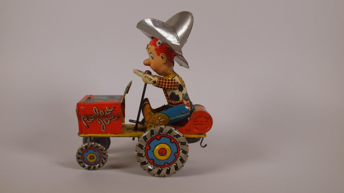 Unique Art Rodeo Joe tin litho wind up car: Unique Art Rodeo Joe tin litho wind up car