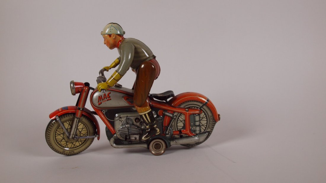 Arnold motorcycle & rider tin litho, missing tire: Arnold motorcycle & rider tin litho, missing tire inserts on base