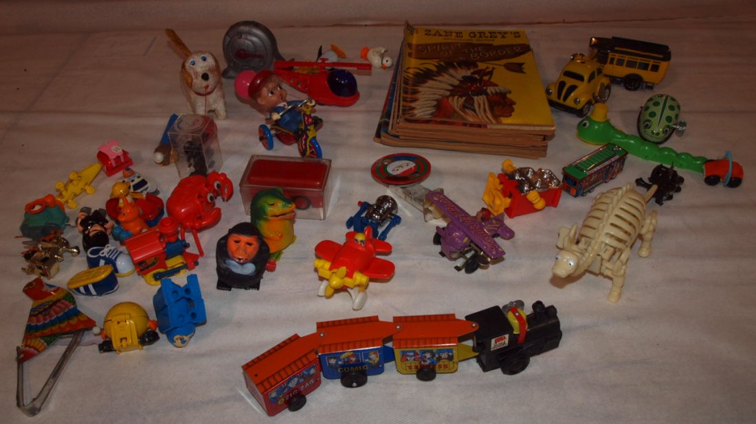 Large lot of plastic & tin wind up toys and assorted: Large lot of plastic & tin wind up toys and assorted comic books, Zane Grey comics, and more