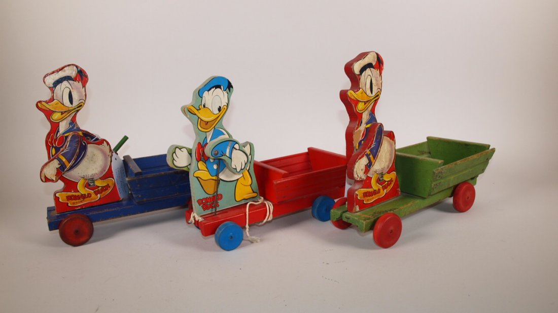 Fisher Price Donald Duck Drum Major cart 1939 blue cart: Fisher Price Donald Duck Drum Major cart 1939 blue cart #550-463, 1940 green cart #550-463, 1951 red cart #500