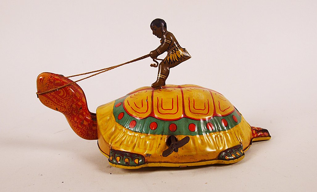 Chein tin litho Native on Turtle wind up toy: Chein tin litho Native on Turtle wind up toy