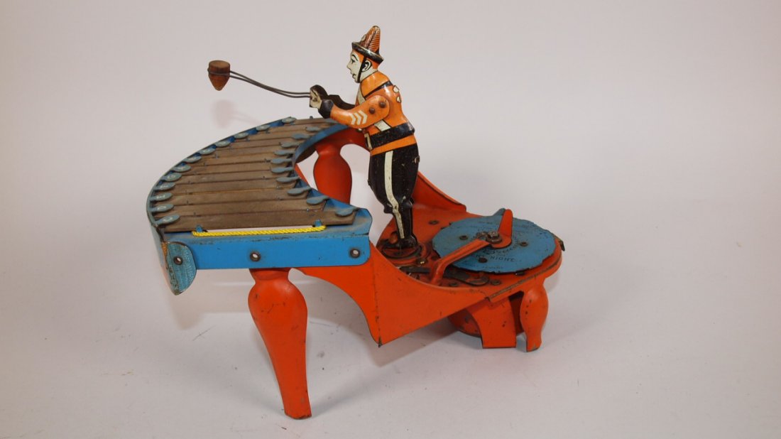 Wolverine Zilotone tin litho wind up toy with 3 music: Wolverine Zilotone tin litho wind up toy with 3 music discs, No. 48