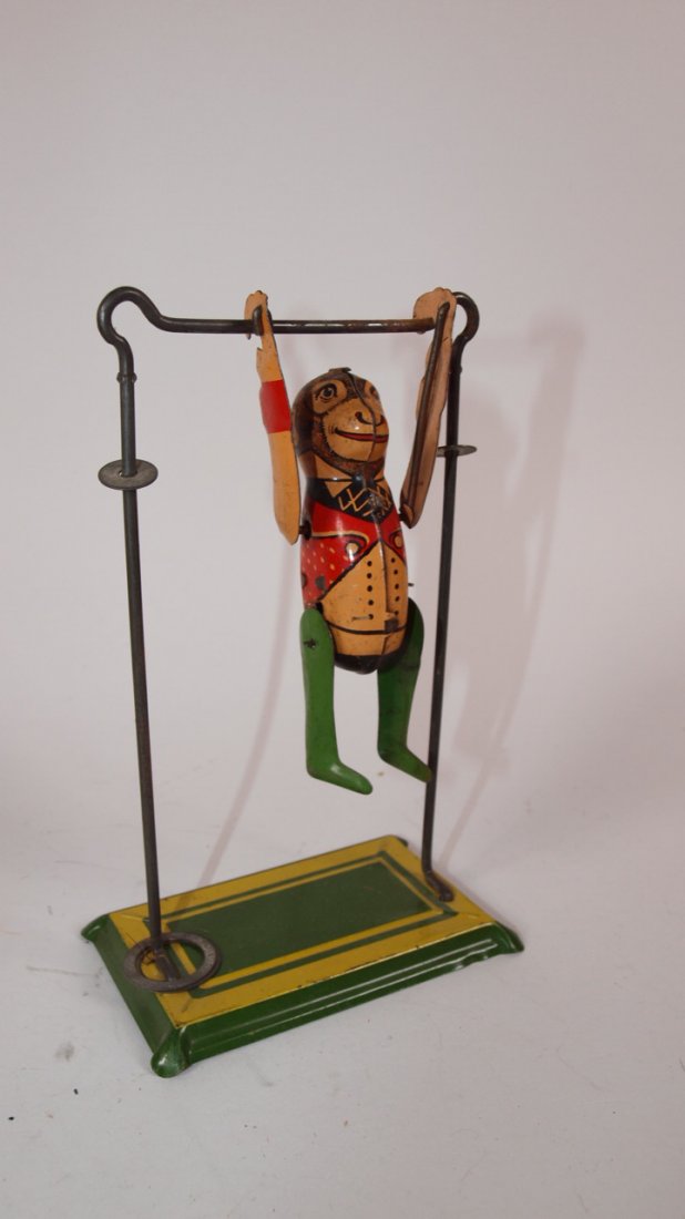 Tin litho monkey gymnast wind up toy 6 1/2": Tin litho monkey gymnast wind up toy 6 1/2"