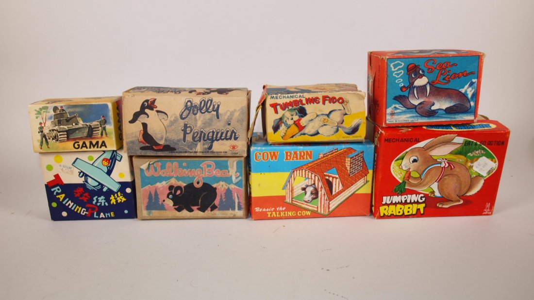 Lot of 8 mechanical toys in original boxes: Gama tank,: Lot of 8 mechanical toys in original boxes: Gama tank, Training Plane, Jolly Penguin, Walking Bear, Tumbling Fido, Cow Barn, Sea Lion, Jumping Rabbit