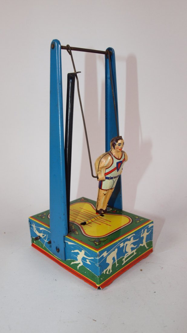 Wyandotte Man on the Flying Trapeze tin litho wind up: Wyandotte Man on the Flying Trapeze tin litho wind up toy