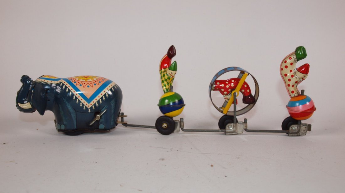 Tin litho wind up elephant and 3 clowns toy: Tin litho wind up elephant and 3 clowns toy