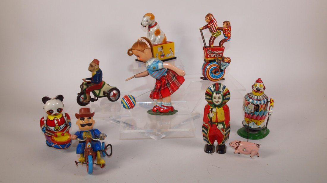 Tin litho lot of 8 wind up toys: Tin litho lot of 8 wind up toys