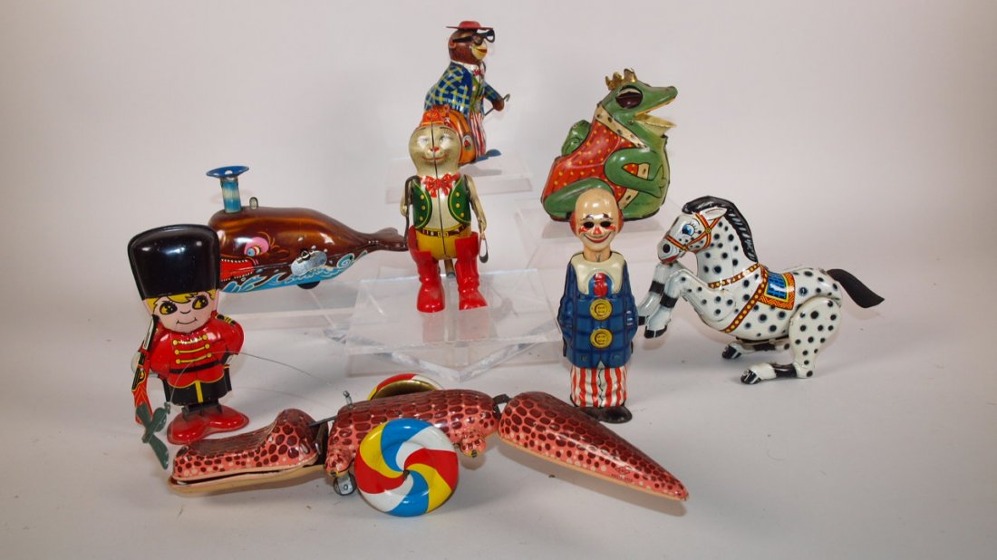 Tin litho lot of 8 wind up toys: Tin litho lot of 8 wind up toys