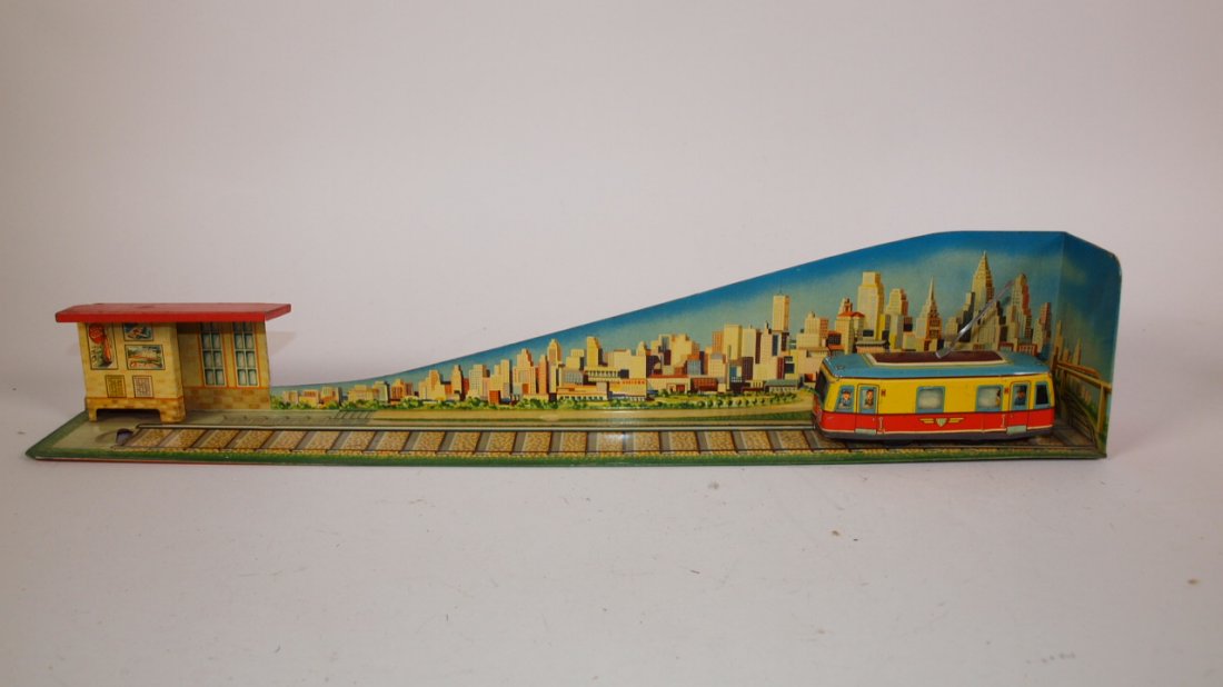 German tin litho streetcar and streetscape wind up toy: German tin litho streetcar and streetscape wind up toy