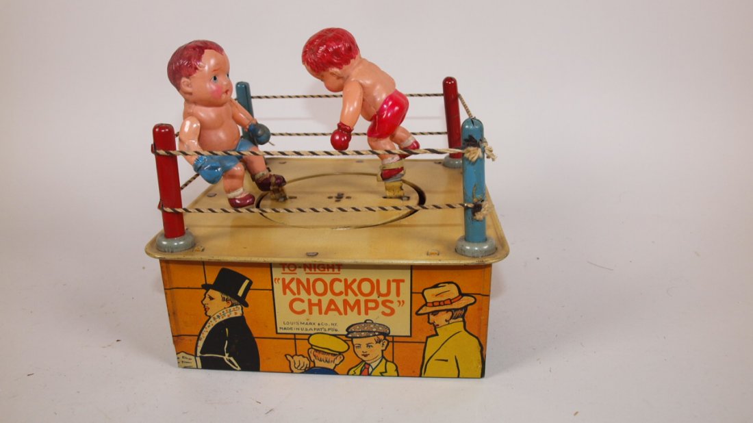 Marx "Knock Out Champs" tin litho & celluloid wind up: Marx "Knock Out Champs" tin litho & celluloid wind up toy