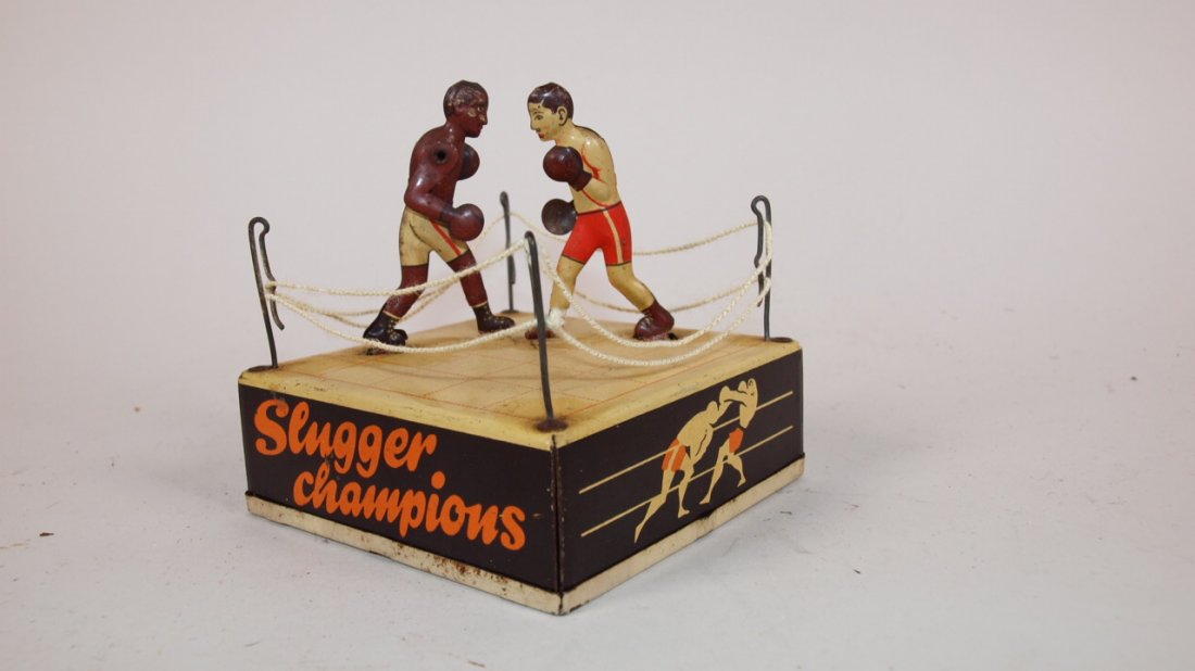 German tin litho Slugger Champion wind up toy: German tin litho Slugger Champion wind up toy