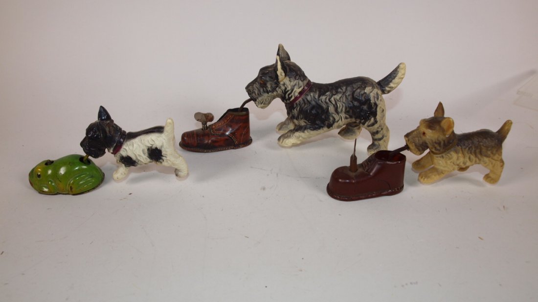 3 celluloid and tin litho scottie dog wind up toys 2: 3 celluloid and tin litho scottie dog wind up toys 2 with shoe, 1 with frog