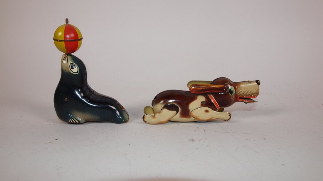 Lehmann tin litho friction seal with ball and German: Lehmann tin litho friction seal with ball and German dog friction toy