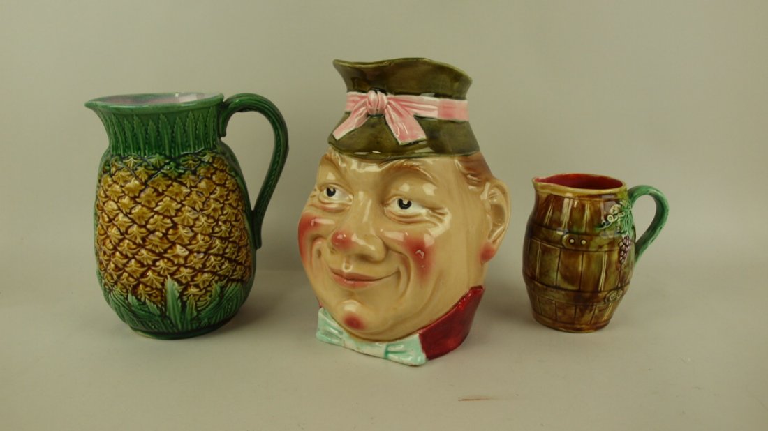 Majolica lot of 3 pitchers pineapple, face jug, and