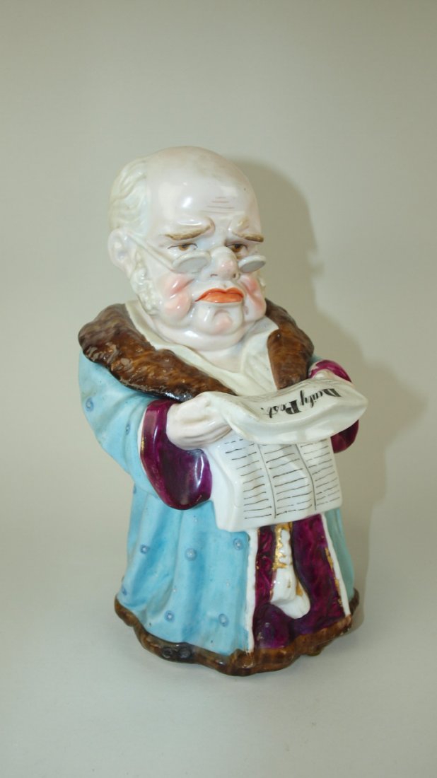 Porcelain humidor tobacco jar of bald man in robe: Porcelain humidor tobacco jar of bald man in robe reading Daily Post, 10"