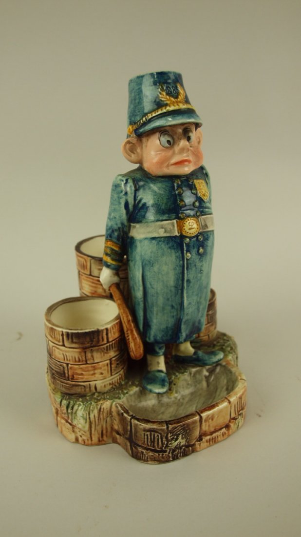 Majolica Palmer Cox Brownie policeman figural match: Majolica Palmer Cox Brownie policeman figural match striker smoking set, 8 1/4"