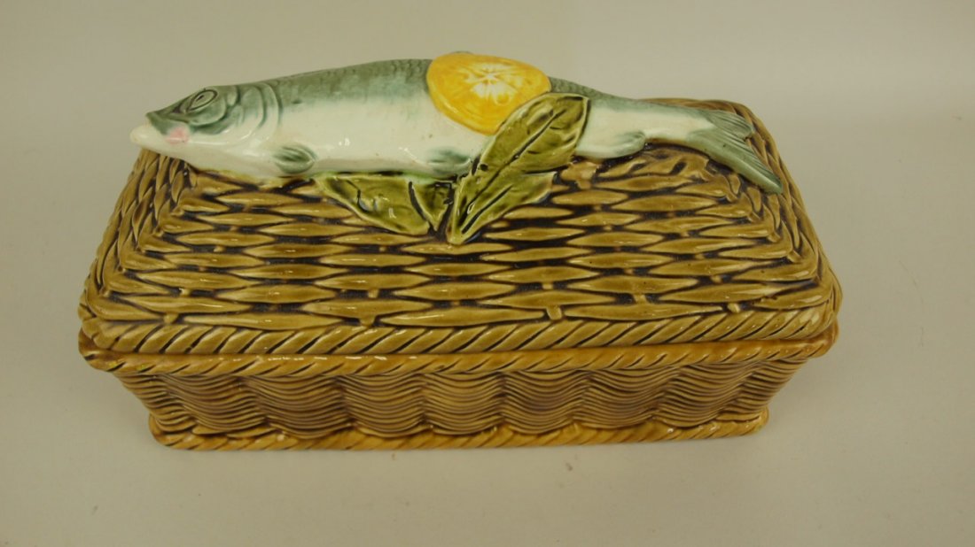 Majolica Continental fish server in the form of a: Majolica Continental fish server in the form of a basket with fish and lemon on cover, 10 1/2"l, 5 1/2"