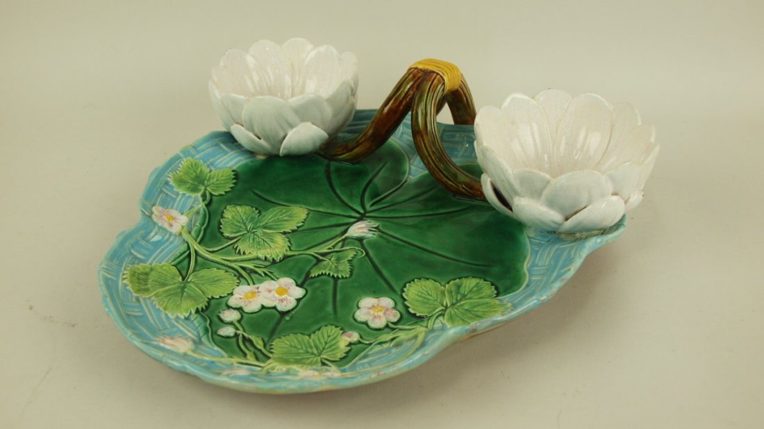 Majolica George Jones strawberry server with water lily: Majolica George Jones strawberry server with water lily cream & sugar cups, professional repair to lily cups, 11"